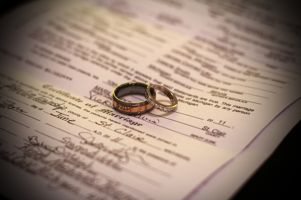 Marriage license and rings